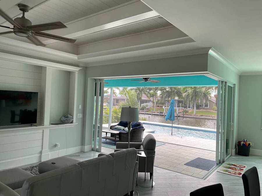 Screened porched open to the house