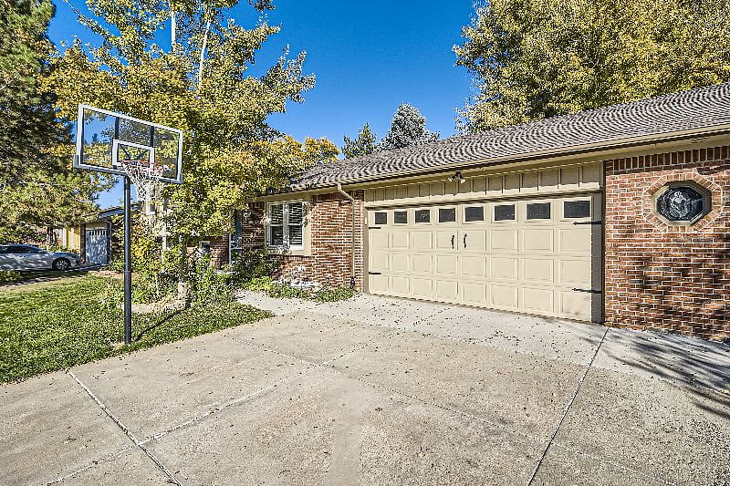 Roomy driveway - park 3 cars or play basketball with built in basketball hoop