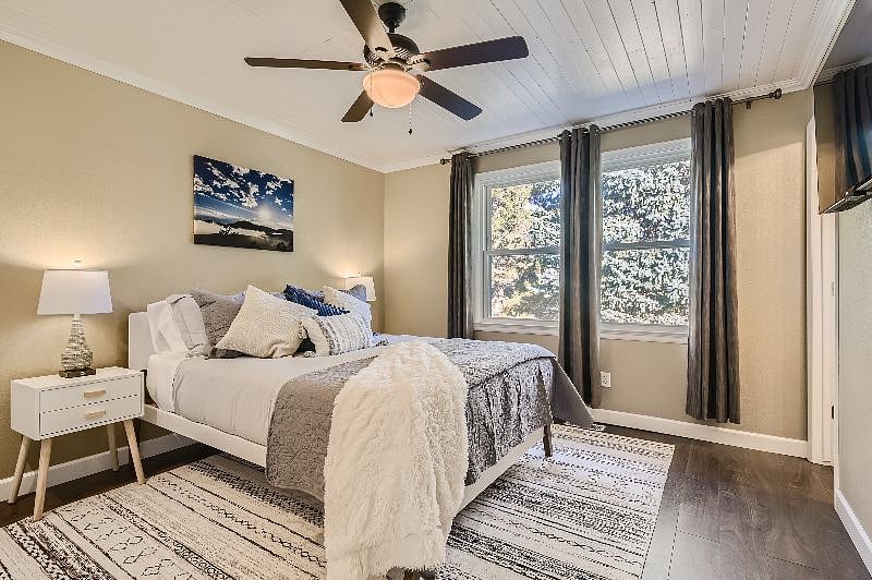 Primary bedroom: King bed with cozy area rug. Heated mattress pad for extra warmth in winter months.