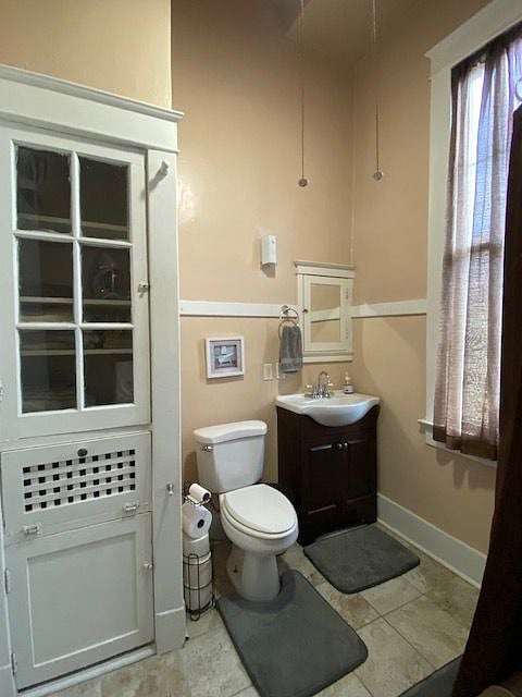 Bathroom equipped with clawfoot tub/shower. Not pictured