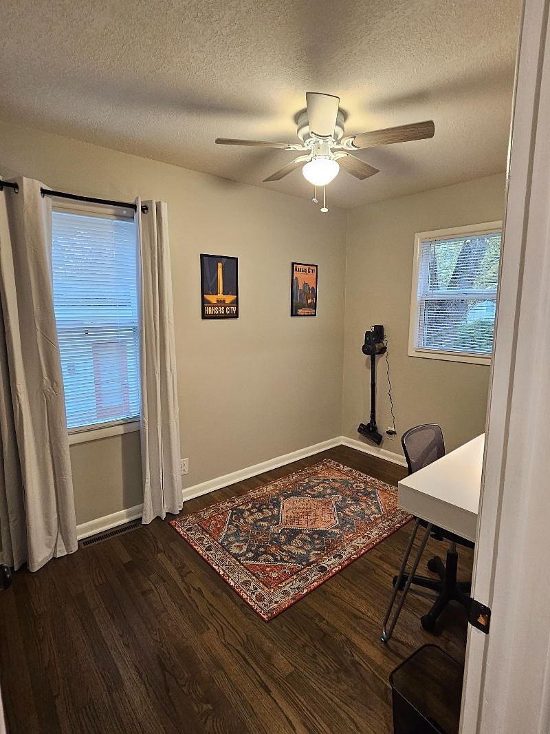 Office also has vacuum and iron/ironing board plus extra storage in closet.