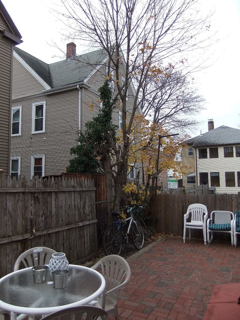 backyard area with seating and grill