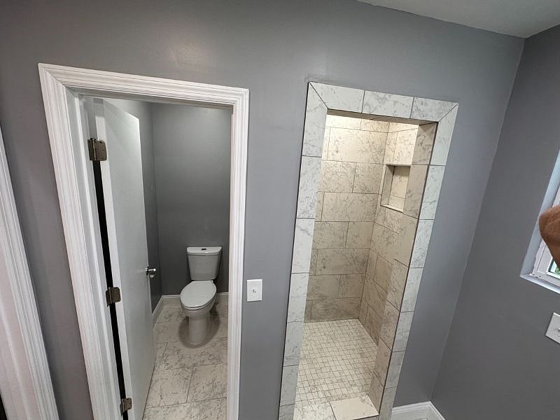 Toilet and walk-in shower