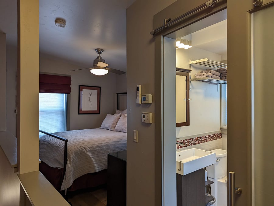 Upstairs - Bedroom, Bathroom, and Laundry.