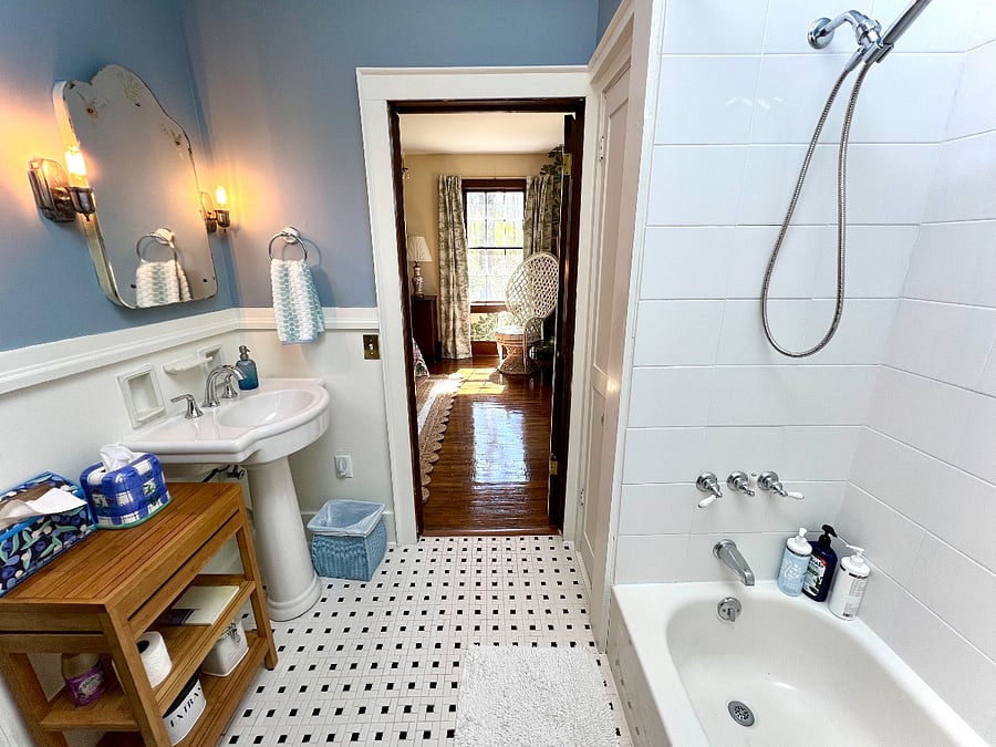 Jack and Jill Bath between primary and bedroom 2 (tub and shower)