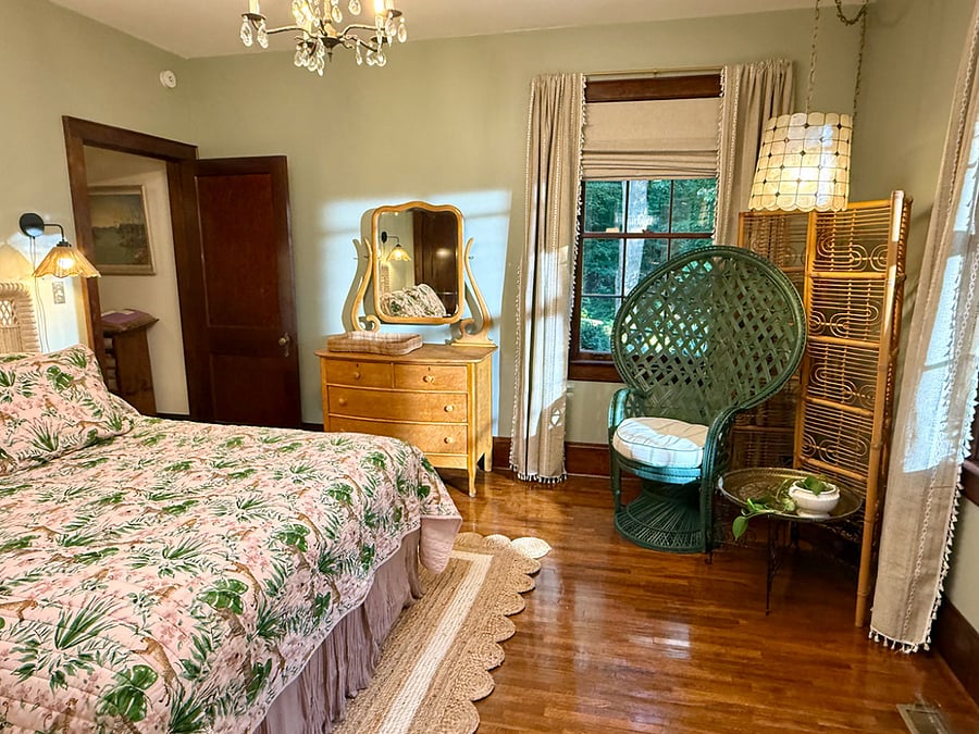 Greens view bedroom 2 with queen bed and blackout shades