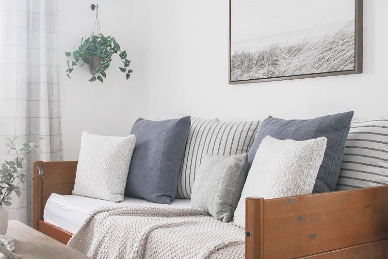 This is a daybed that can act as a sofa or can be a twin bed with a trundle underneath.