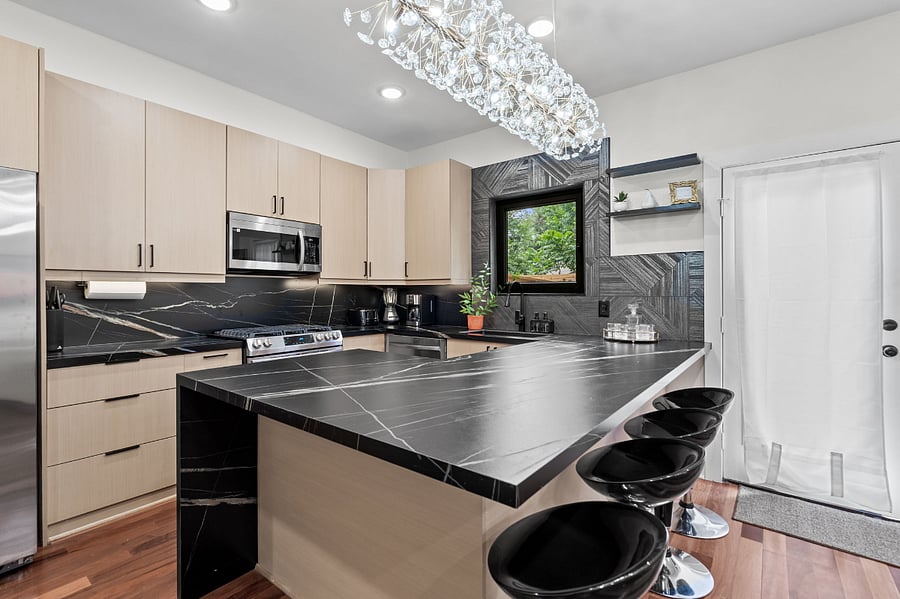 Fully stocked kitchen, gas stove, dishwasher, refrigerator with ice maker, air fryer
