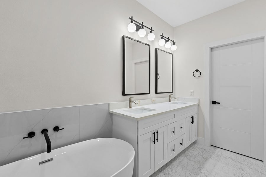 2 sink vanities with quartz countertop and ample storage, hair dryer