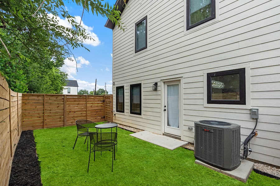 Large backyard with gas grill