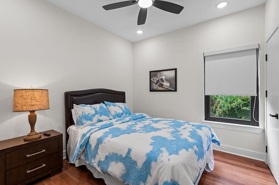 Queen bed, ensuite closet, smart TV, blackout shades, remote control ceiling fan