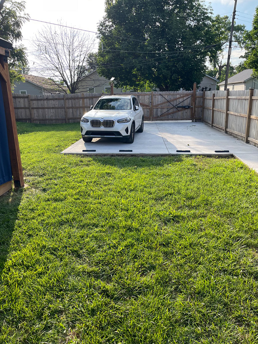 Parking pad with automatic gate opener w/remote
