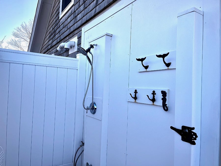 Spacious outdoor shower for use during the summer season