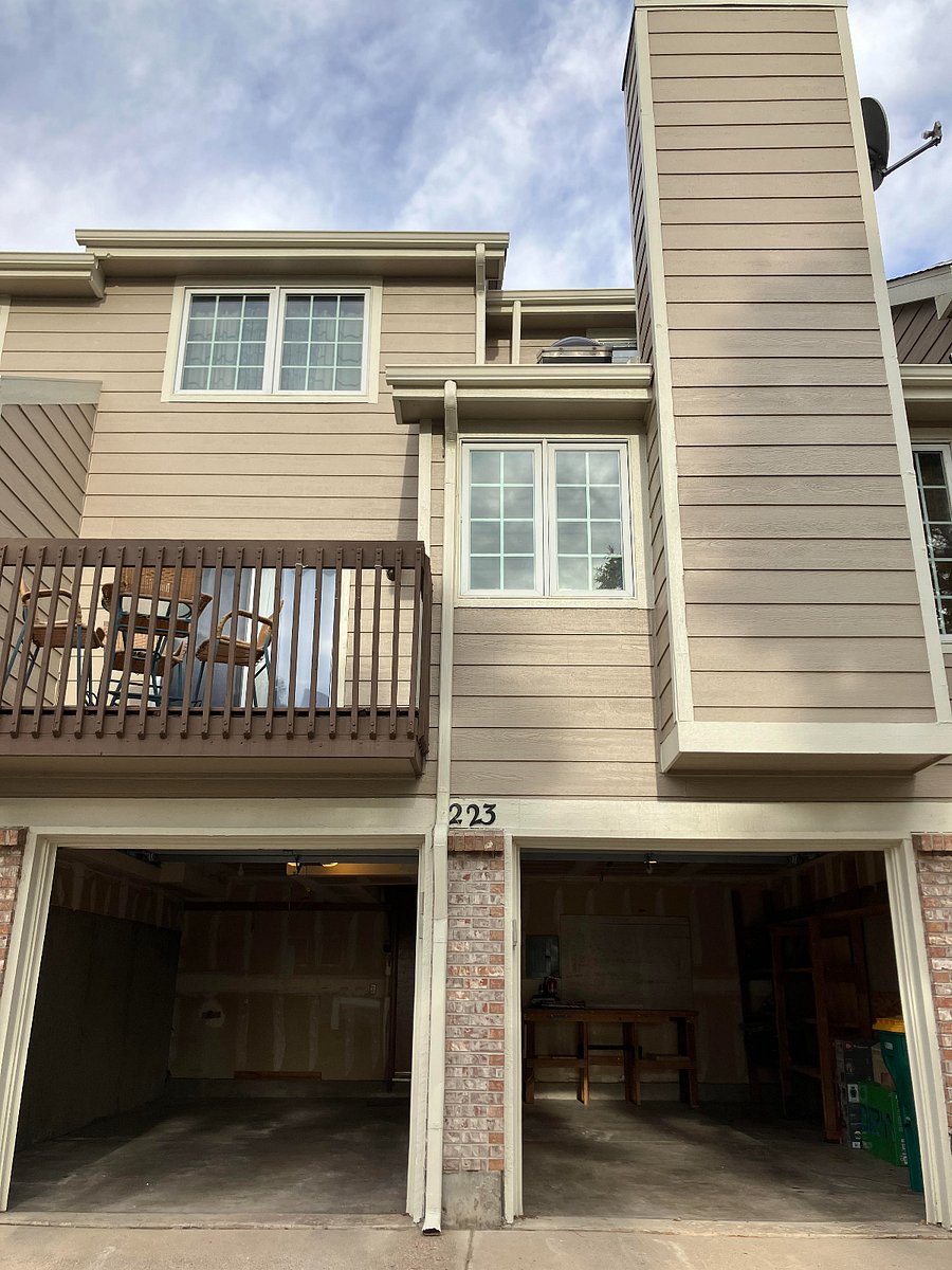 Garage entrance to the three-story townhouse unit.