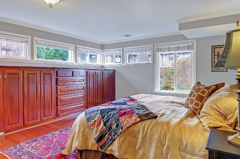 Master Bedroom with king bed and extensive built-ins.
