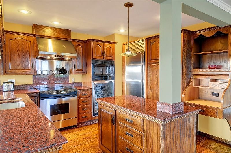 Granite island for food prep.