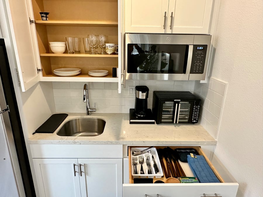 Fully stocked for your stay  enjoy a full-size microwave, air fryer/toaster, coffee maker, dishes, and utensils.