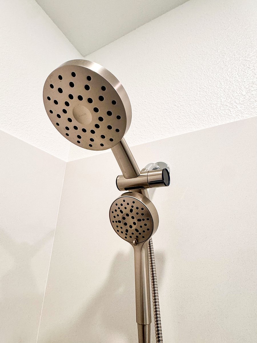 Tired of weak Airbnb showers? 
Ours delivers strong, consistent pressure with a modern dual-head setup  featuring a wide rainfall head and a handheld wand for easy rinsing.  Clean, stylish, and seriously satisfying.
