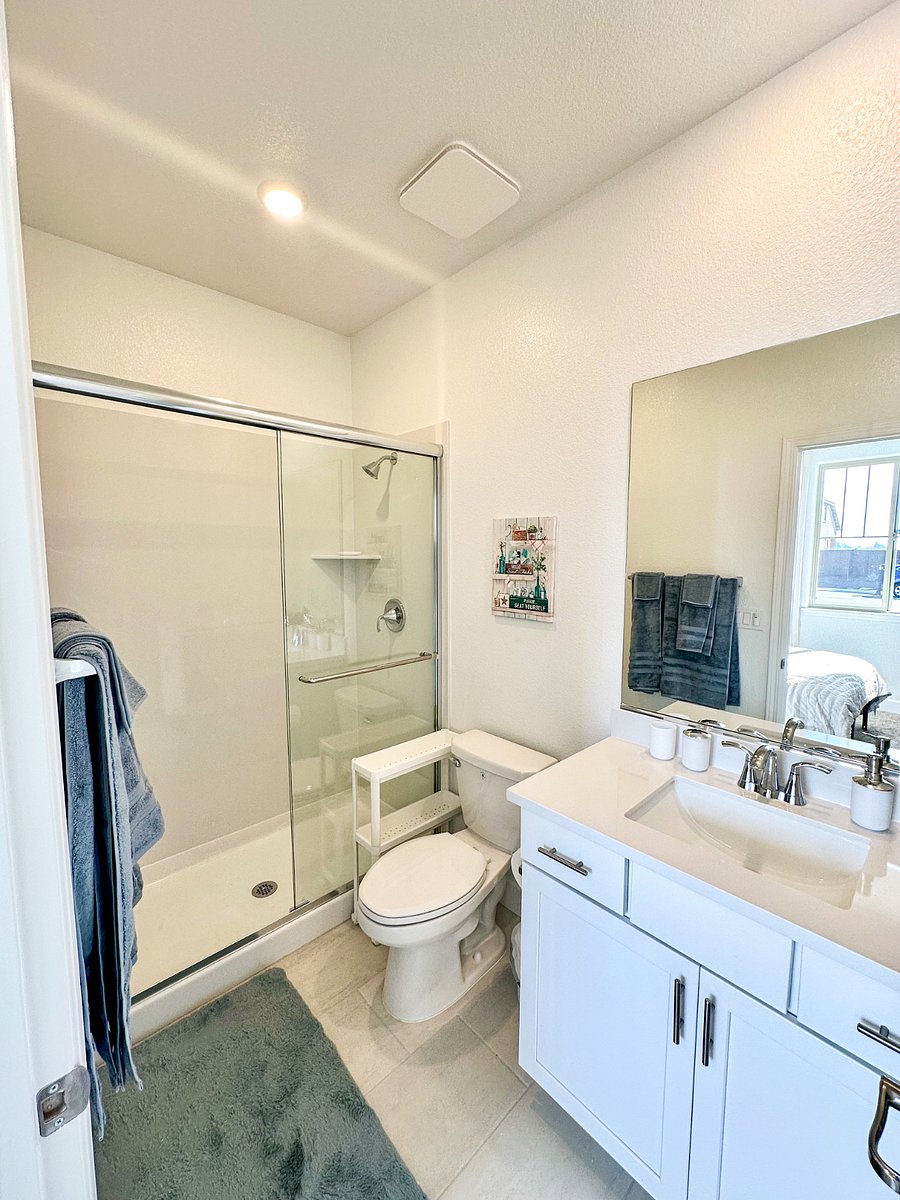 Squeaky clean and modern  a full-size bathroom with everything you need to refresh and reset .