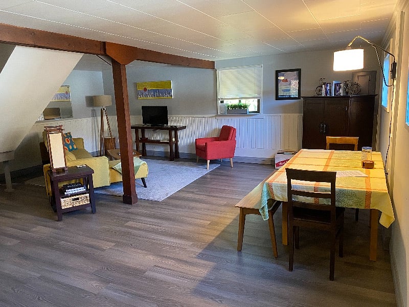 The kitchen and living area are downstairs, and they are one great big room.