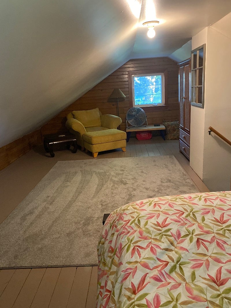 this is the upstairs of the cottage loft, and the bed area is on the other side. The window looks out on our 1 acre property.