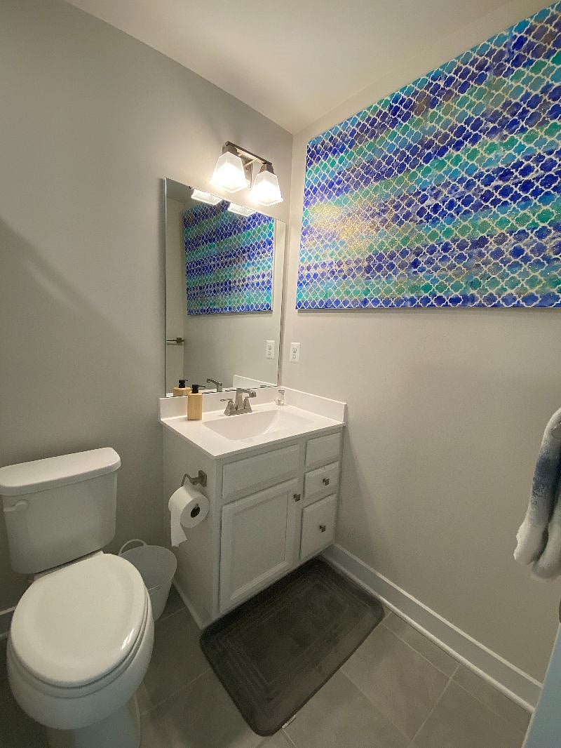 full size private bathroom with tub
