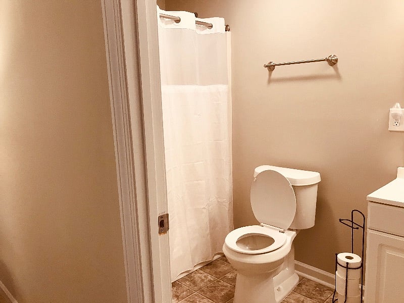 Sizeable bathroom with good-sized bathtub.