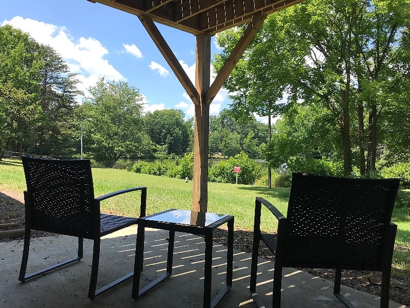 Private patio on lower level with view of the lake.