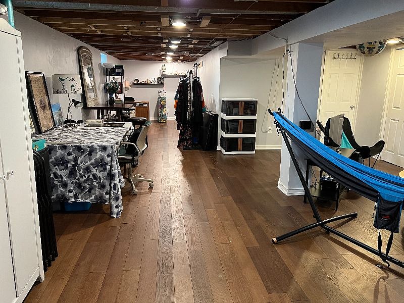 Basement also has a projector and Wii console set up, plus a desk and table available to work at.