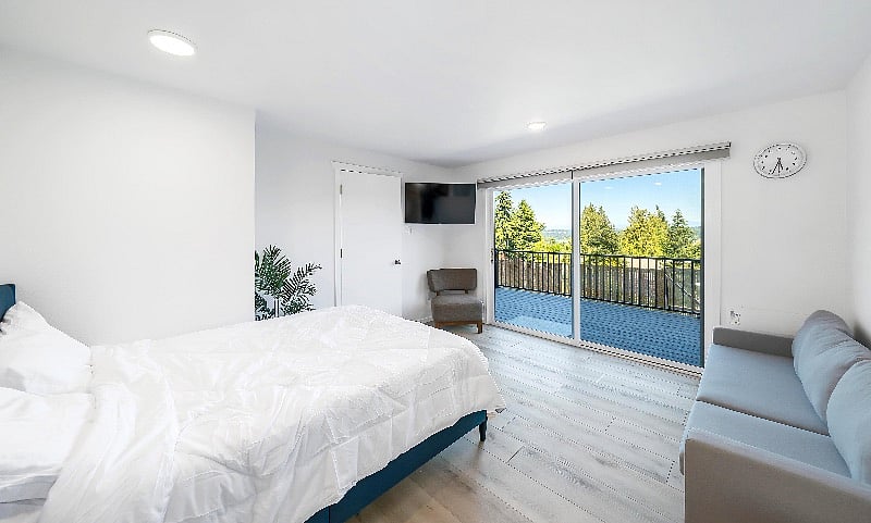 Queen Size Bed. Sofa, and Smart TV