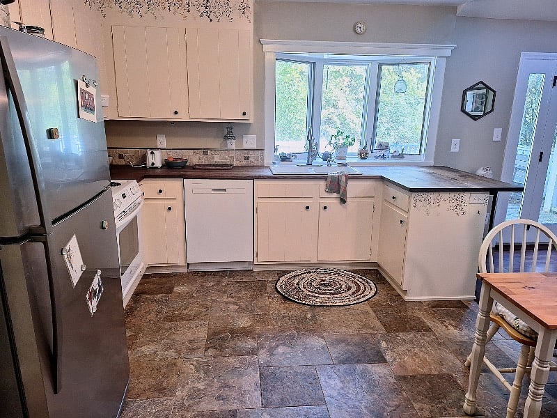 Fully eqpt. kitchen incl: coffee maker, microwave, airfryer, blender, ninja, toaster, and dishwasher.