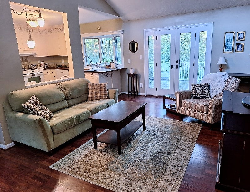 Open floor plan with French doors onto private deck