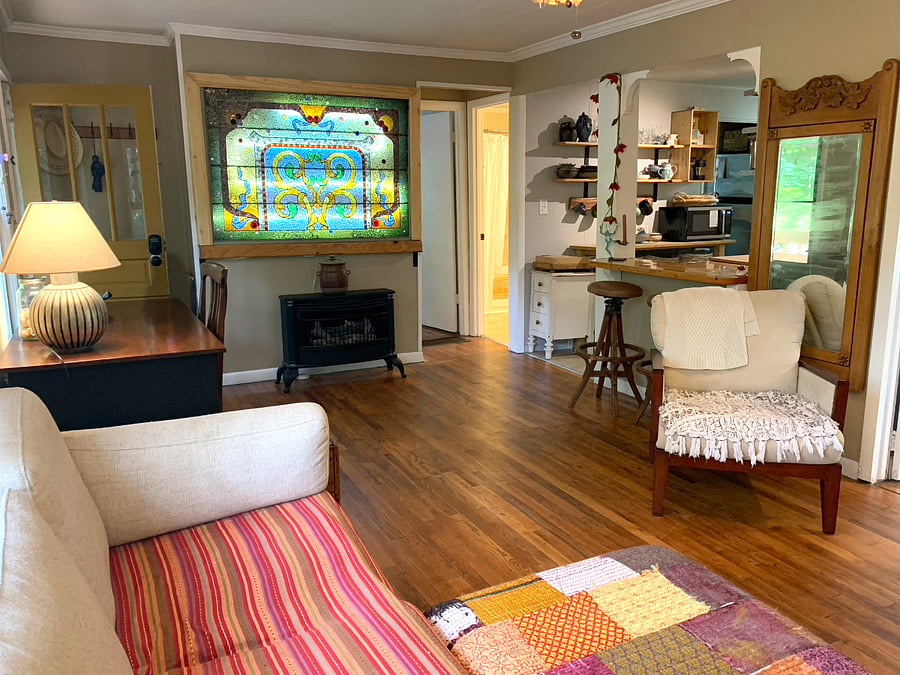 Living room with antique stained glass window