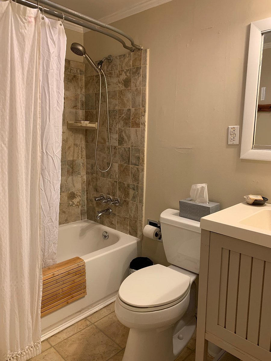 bathroom with full size tub and shower