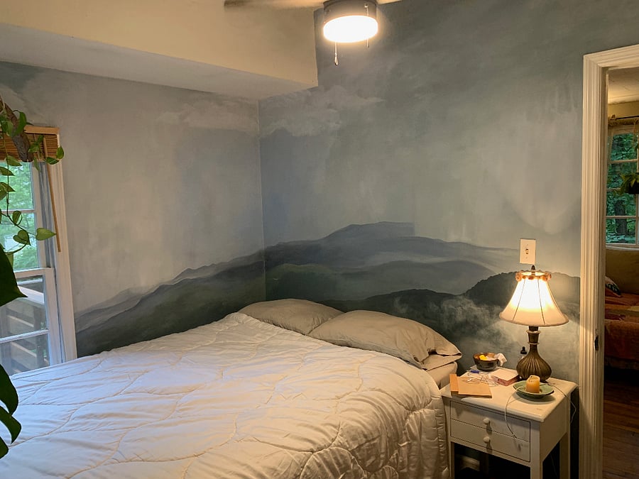 Main bedroom: queen sized mattress; mural of Mount Pisgah in the clouds