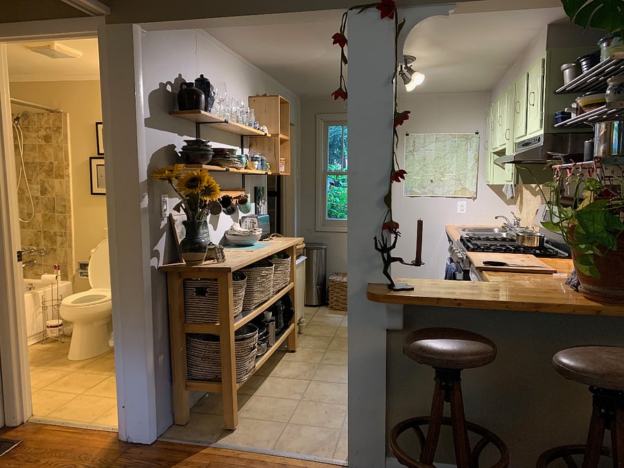 Kitchen is well appointed with pots, pans, dishes, utensils. Fully stocked spice cabinet and pantry.