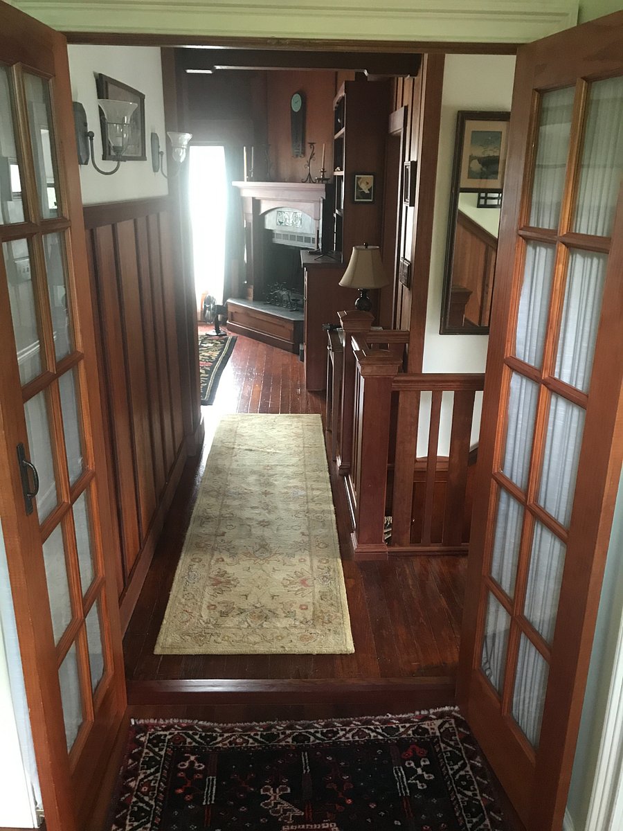 Hall from entry to living room, kitchen to the right