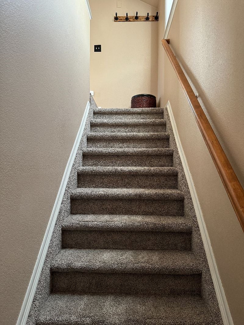 Interior stairway to the Carriage House unit. 