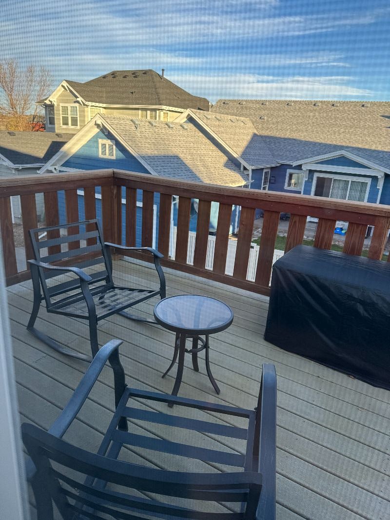 Private deck. The deck furniture cushions are located in the storage box during the winter months and are easily accessible on warm days during the winter.