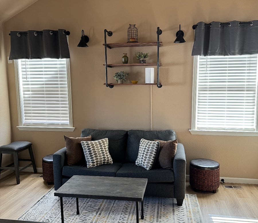 Loveseat and table, which converts to a full sized sleeper sofa.  This is also the primary seating area in the unit.