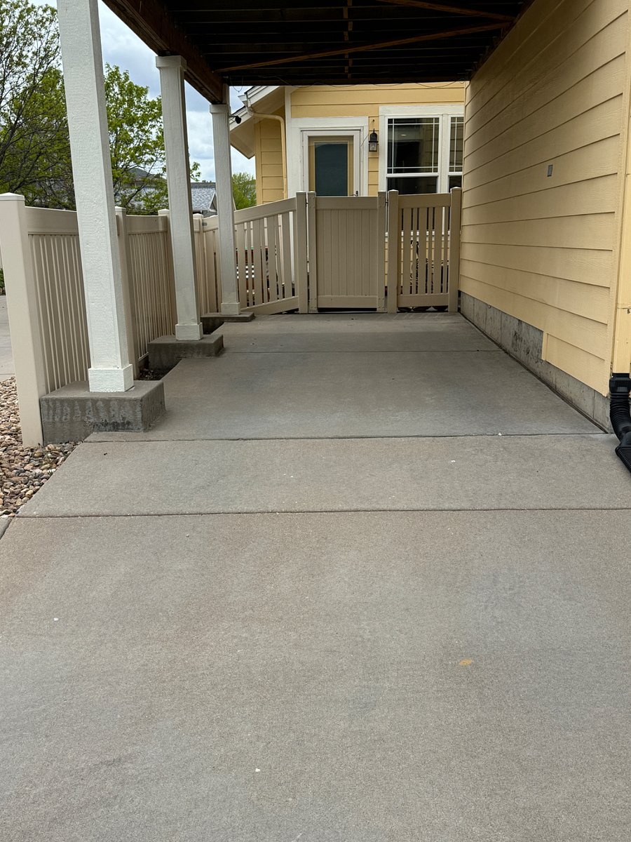 Front view of Carport and parking space.