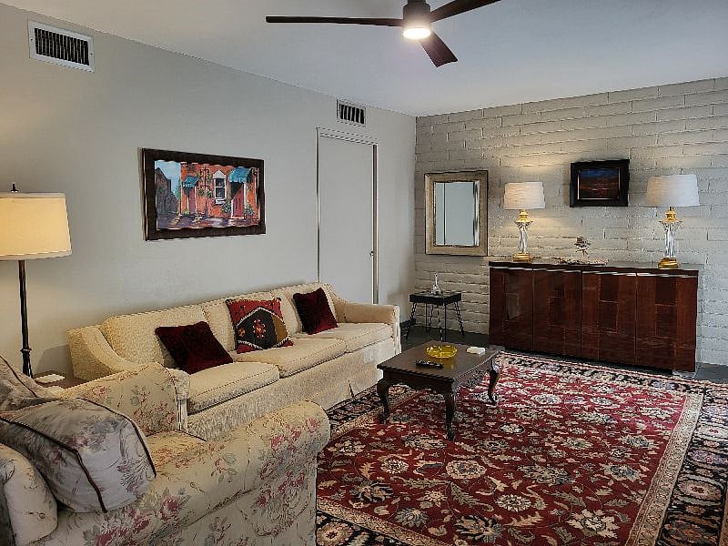 Living room, with pocket door to kitchen