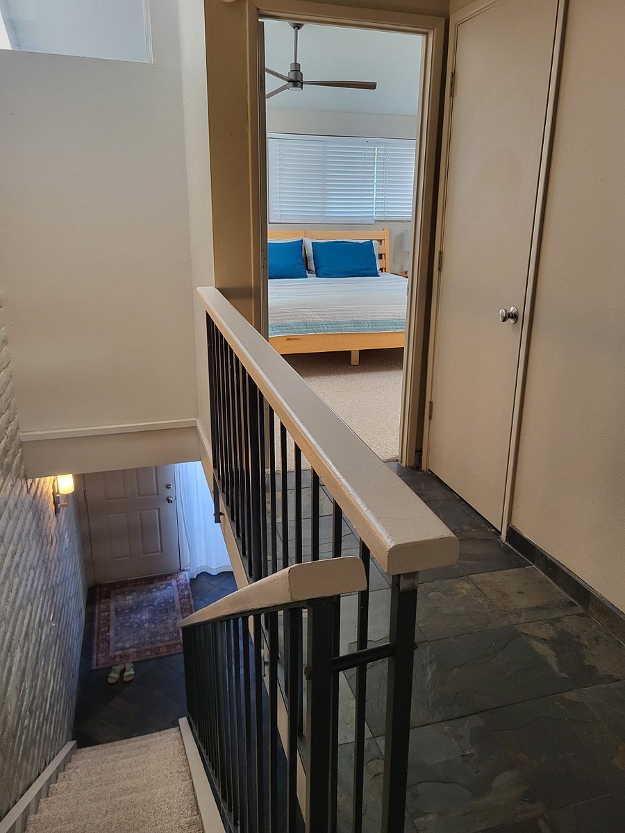 Stairwell showing front door and entrance to ensuite master