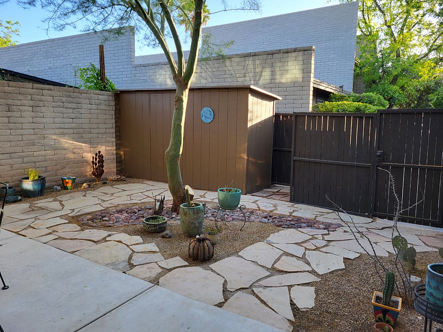 Shaded patio with view to the adjacent courtyard