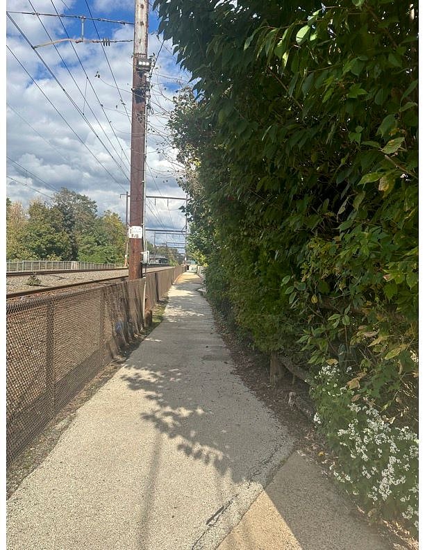 Walkway to Melrose Station. Steps away.