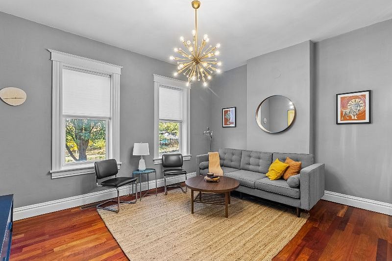 Living room with comfy couch and side chairs