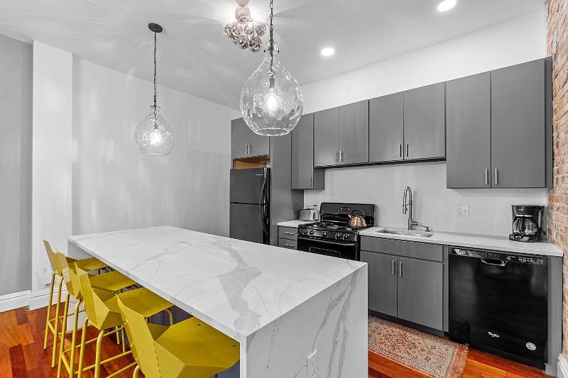 Updated kitchen with quartz counters and large center island