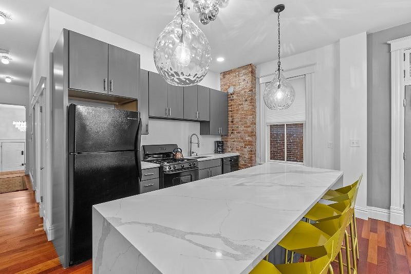 Updated kitchen with quartz counters and large center island