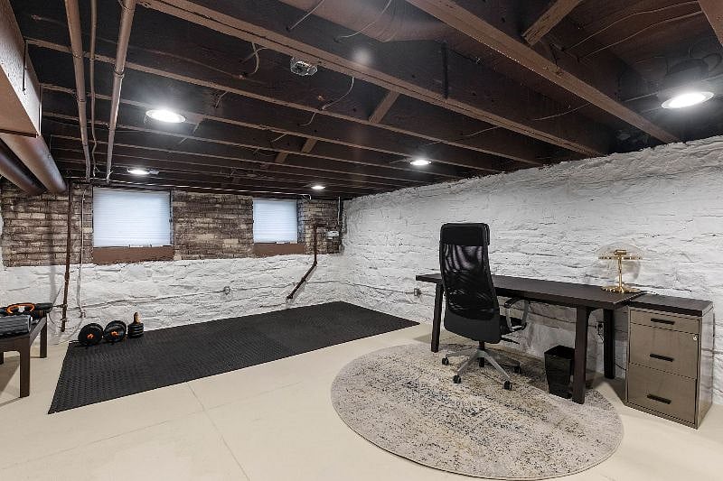 Basement work station and work out area with weights