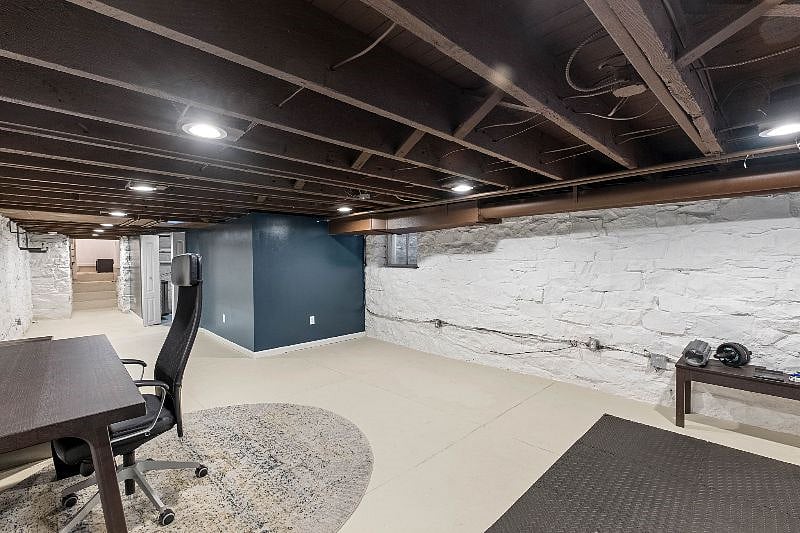 Basement work station and work out area with weights